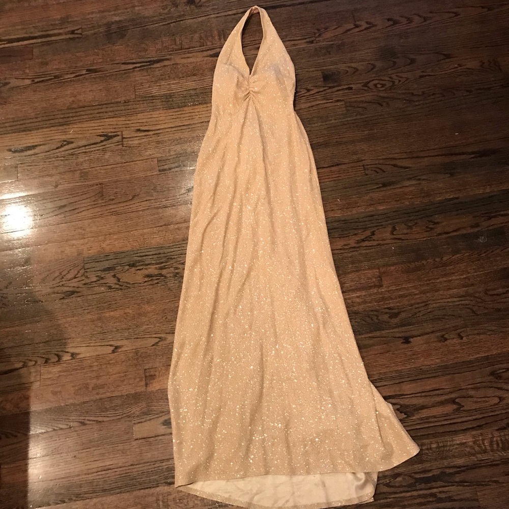 Shimmer gold halter evening gown.